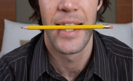 chewing pencil